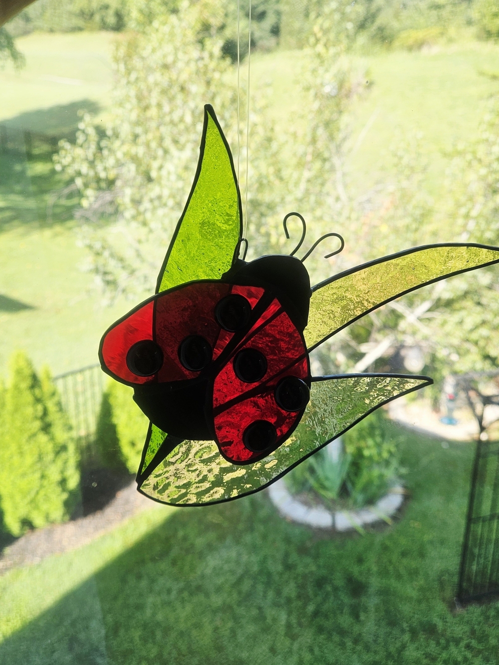 Stained Glass Ladybug Window Hanging in Red and Green